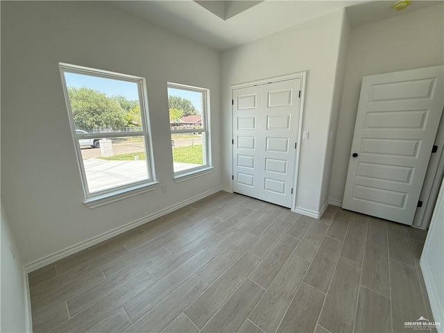 3614 Tecate St, Edinburg, TX 78542 - unfurnished bedroom with light wood-style flooring and baseboards