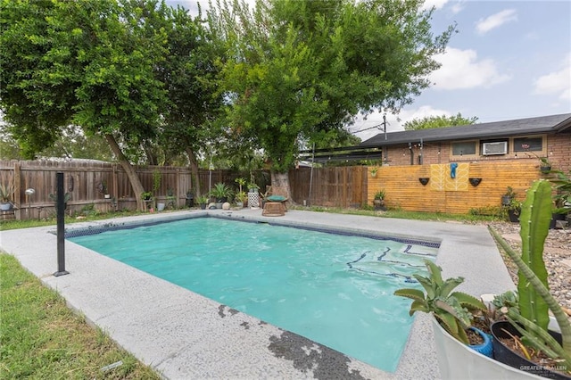 view of pool with a fenced backyard and a fenced in pool