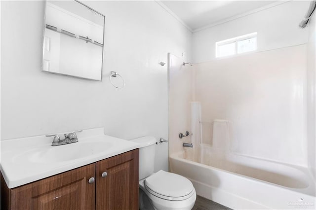 bathroom featuring shower / bath combination, vanity, ornamental molding, and toilet