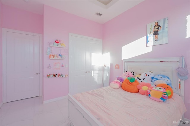 2511 Wisteria St, Rio Grande City, TX 78582 - bedroom with light marble finish flooring and baseboards