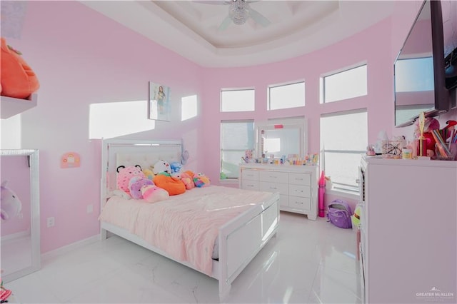 2511 Wisteria St, Rio Grande City, TX 78582 - bedroom with a towering ceiling, light marble finish flooring, and ceiling fan
