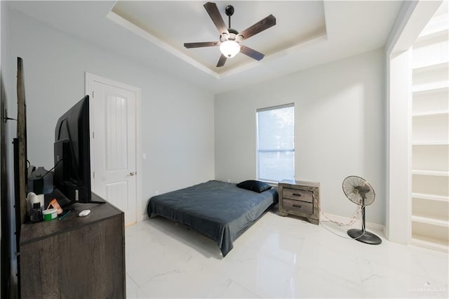 2511 Wisteria St, Rio Grande City, TX 78582 - bedroom with a tray ceiling, marble finish flooring, and ceiling fan