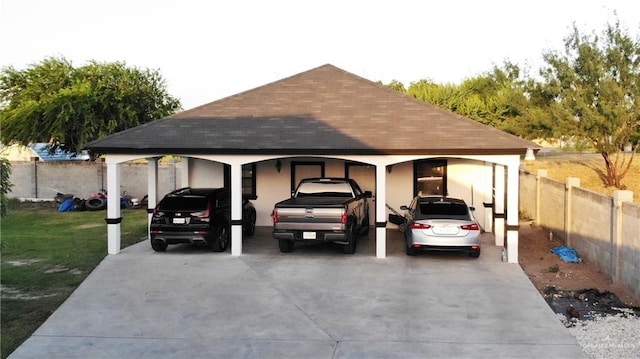 2511 Wisteria St, Rio Grande City, TX 78582 - view of parking featuring a detached carport and driveway