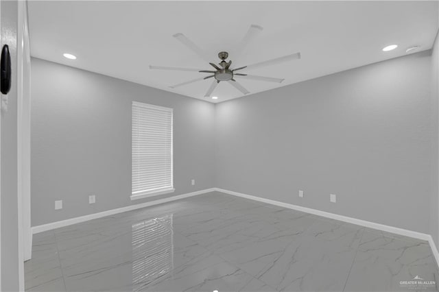 empty room featuring ceiling fan