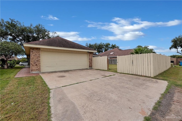 garage with a yard