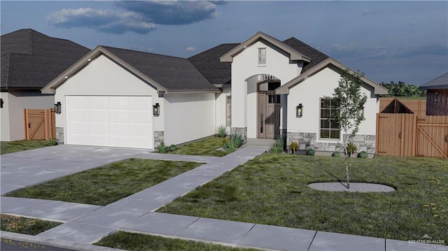 view of front facade with a garage, stone siding, stucco siding, and a gate