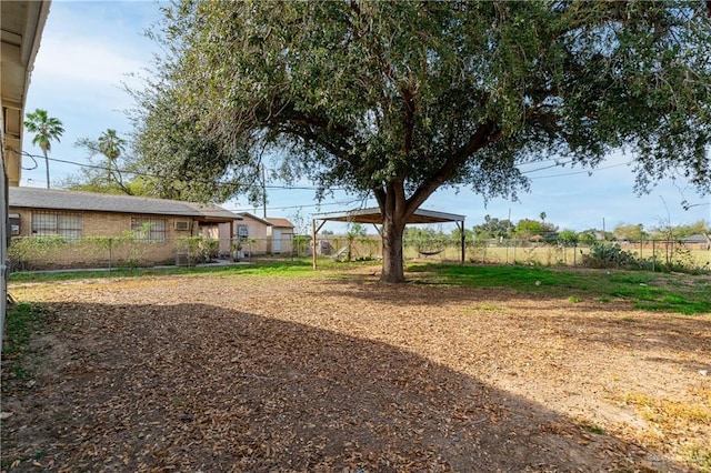 view of yard featuring fence