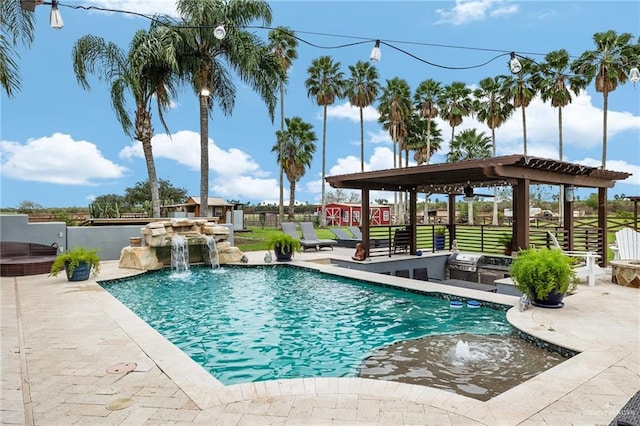 view of pool with pool water feature, area for grilling, and a patio area