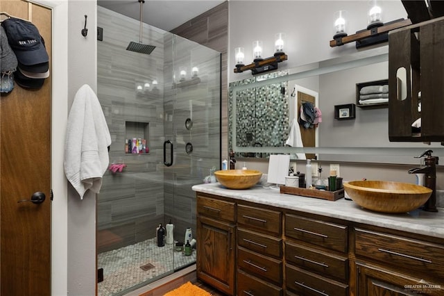 bathroom with vanity and walk in shower