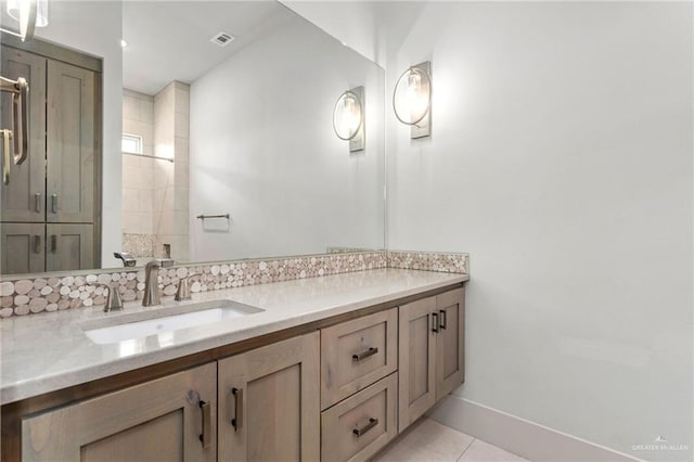 bathroom featuring tile patterned floors and vanity