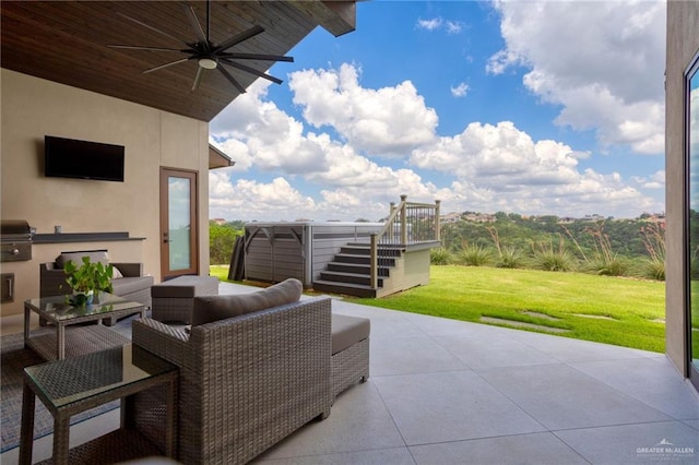 view of patio / terrace featuring an outdoor hangout area, area for grilling, and ceiling fan