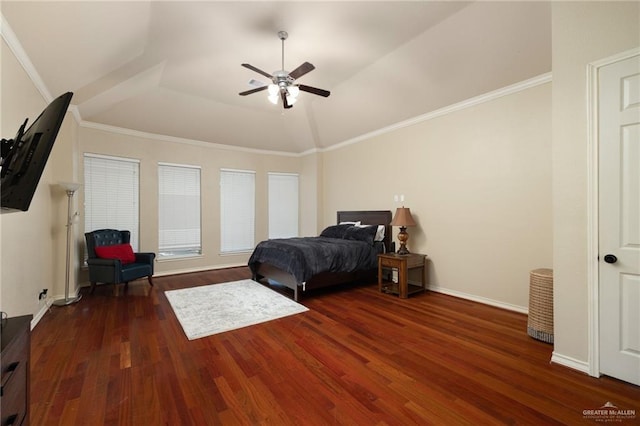 bedroom featuring lofted ceiling, crown molding, ceiling fan, and dark wood-type flooring