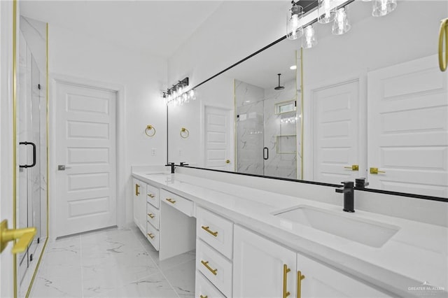 full bathroom with double vanity, marble finish floor, a marble finish shower, and a sink