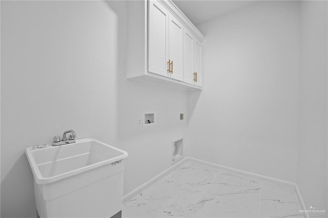 laundry room featuring cabinet space, marble finish floor, hookup for an electric dryer, washer hookup, and a sink