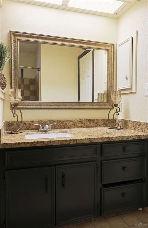 3208 Kiwi Ave, Mcallen, TX 78504 - full bath featuring vanity, a shower, and tile patterned floors