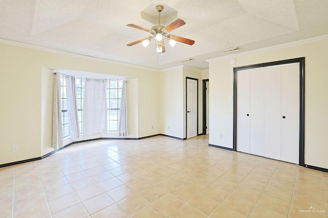 3208 Kiwi Ave, Mcallen, TX 78504 - unfurnished bedroom featuring a textured ceiling, crown molding, baseboards, light tile patterned floors, and a ceiling fan