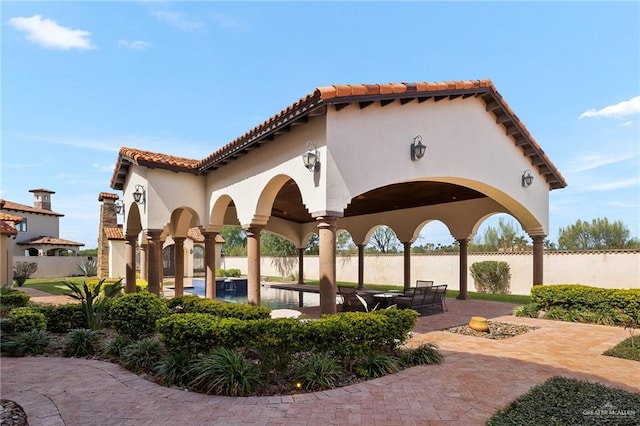 view of property's community with a patio