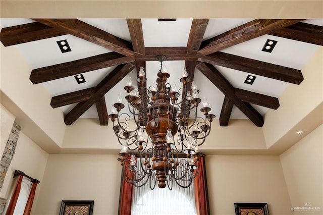 interior details featuring an inviting chandelier