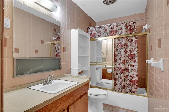 405 S 29th St, Mcallen, TX 78501 - full bath featuring toilet, vanity, shower / tub combination, and tile walls