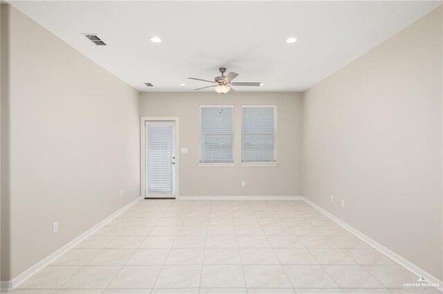 unfurnished room with ceiling fan