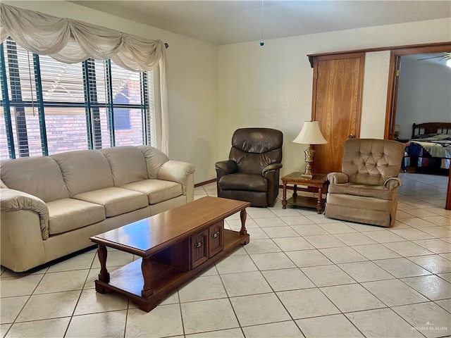 living area featuring light tile patterned flooring