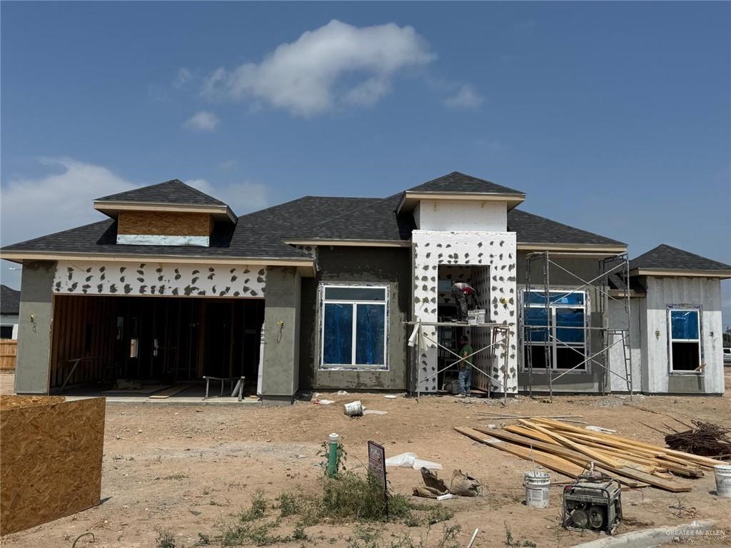 3003 Truman Ave, Mission, TX 78574 - property under construction with a garage