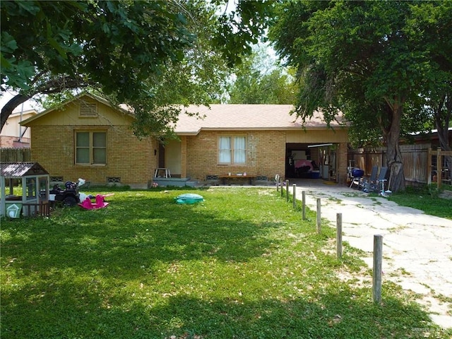 910 Bryce Dr, Mission, TX 78572 - single story home featuring brick siding, concrete driveway, and a carport
