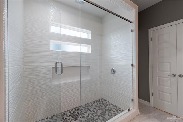 bathroom with a stall shower