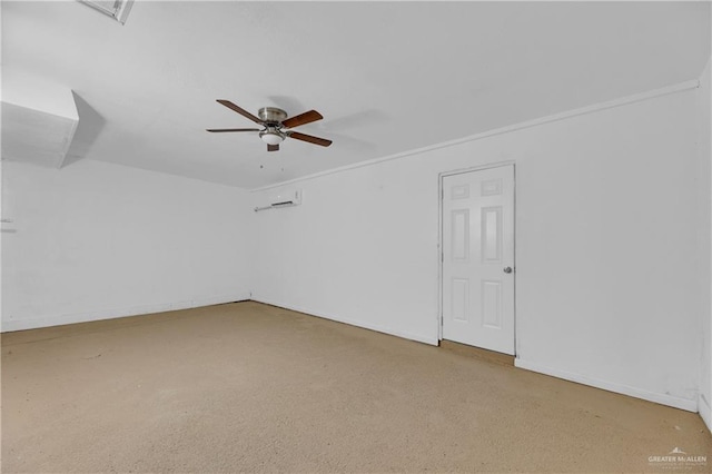 spare room with carpet and ceiling fan