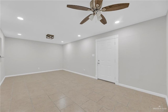 empty room featuring ceiling fan