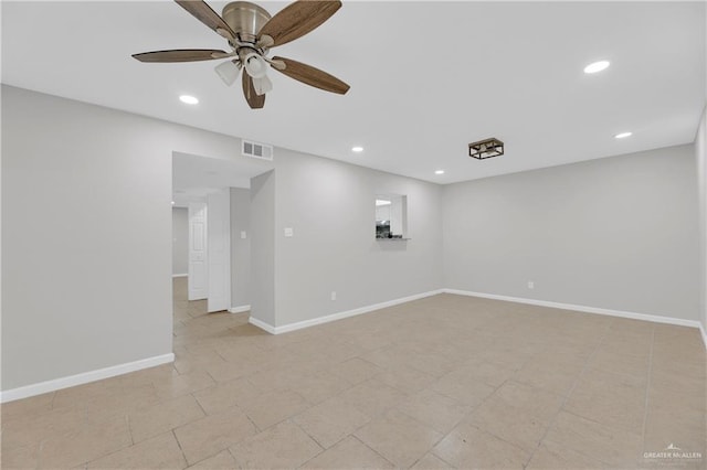 spare room with ceiling fan