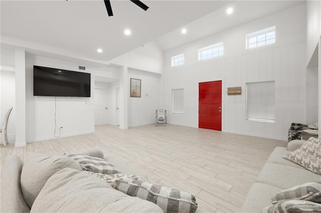 11115 N La Homa Rd, Mission, TX 78574 - living area featuring high vaulted ceiling, ceiling fan, wood finished floors, recessed lighting, and baseboards