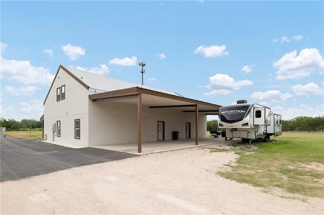 11115 N La Homa Rd, Mission, TX 78574 - view of outbuilding with dirt driveway and a carport
