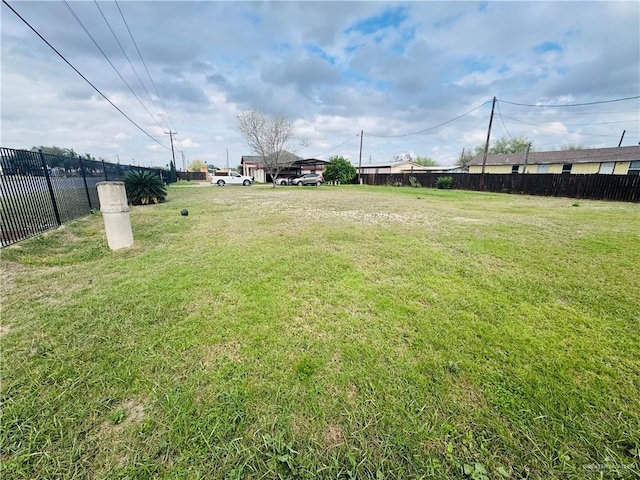 view of yard with fence