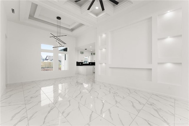 1922 Lime St, San Juan, TX 78589 - unfurnished room featuring a towering ceiling, marble look tile flooring, beamed ceiling, baseboards, and coffered ceiling
