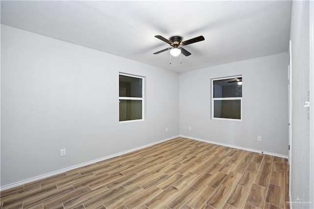 314 N Veterans Blvd, Edinburg, TX 78541 - unfurnished room with wood finished floors and ceiling fan