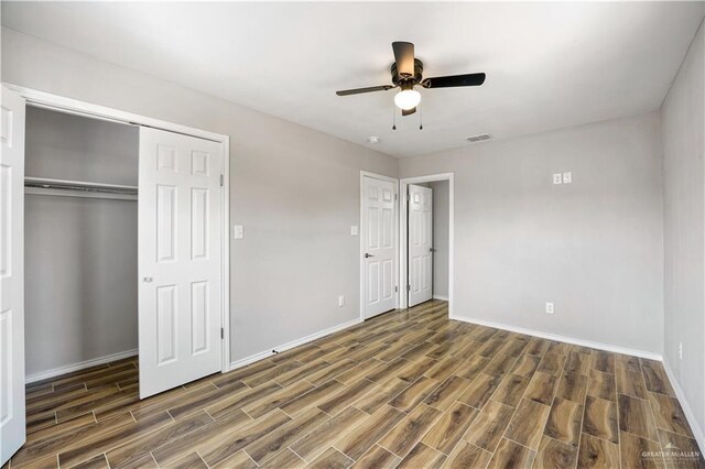 314 N Veterans Blvd, Edinburg, TX 78541 - unfurnished bedroom with wood finished floors, baseboards, a closet, and a ceiling fan