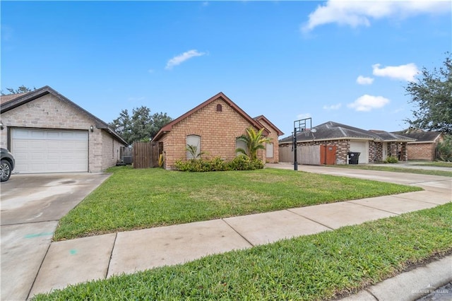 view of front of home featuring a garage and a front lawn