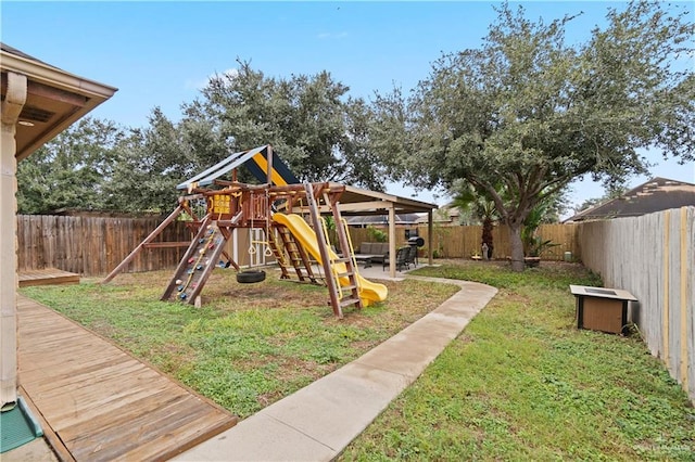 view of jungle gym featuring a yard