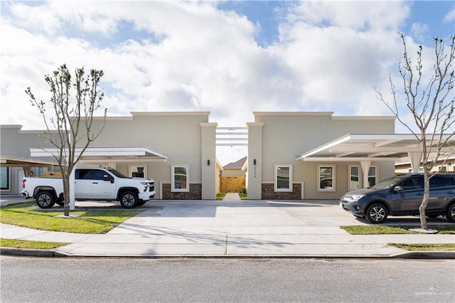 view of front of house with a carport