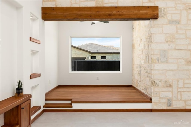 interior space with hardwood / wood-style flooring and ceiling fan