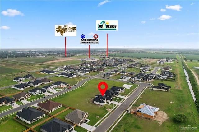 136 Finch Ln, Los Fresnos, TX 78566 - aerial perspective of suburban area