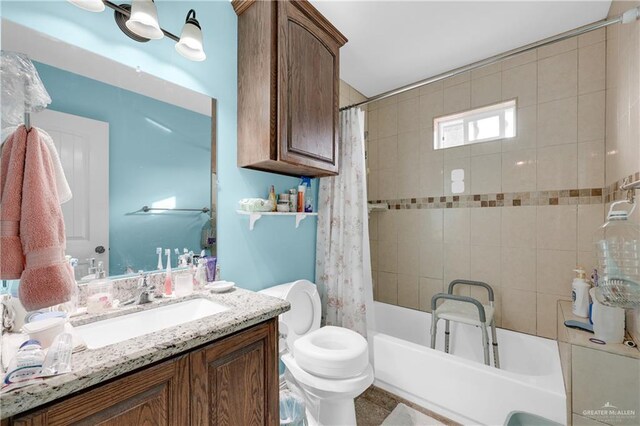 722 E Fay St, Edinburg, TX 78539 - full bath with shower / tub combo with curtain, toilet, and vanity