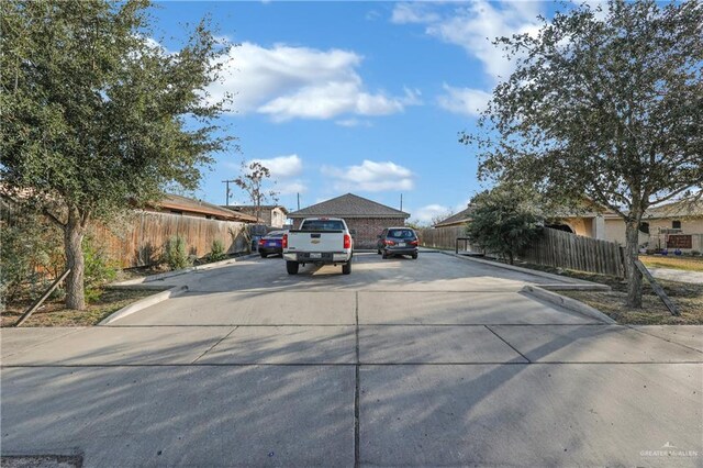 722 E Fay St, Edinburg, TX 78539 - view of front facade with fence and driveway