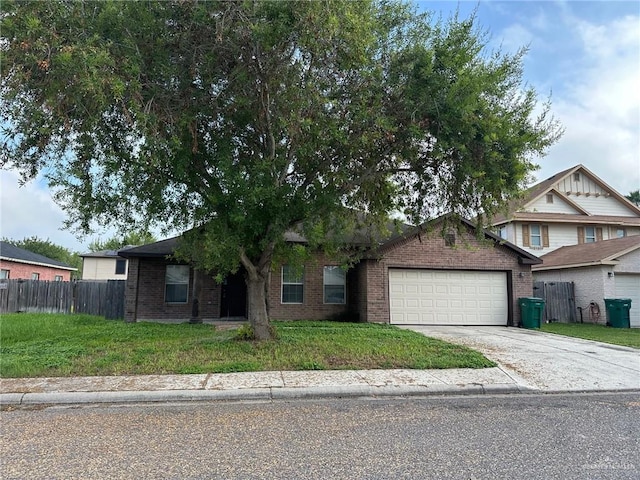 view of front of house with a garage and a front yard