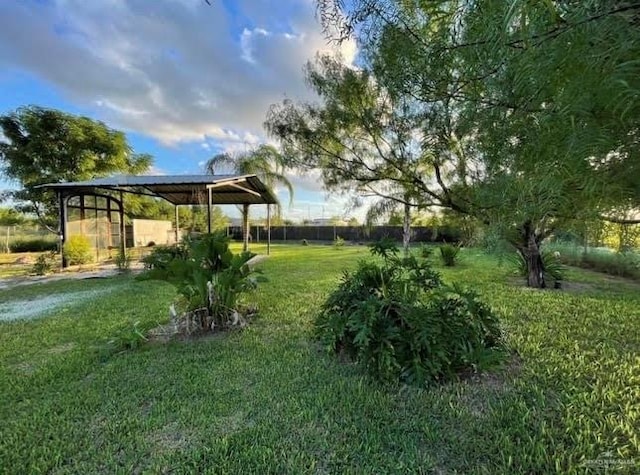 view of yard with a carport