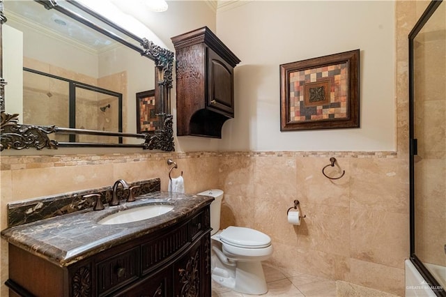 full bathroom with crown molding, combined bath / shower with glass door, tile walls, and toilet