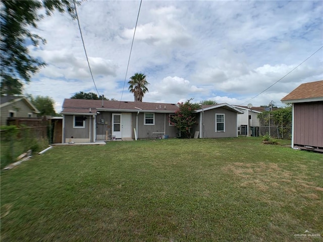 205 W Beck St, Harlingen, TX 78550 - back of property featuring a fenced backyard