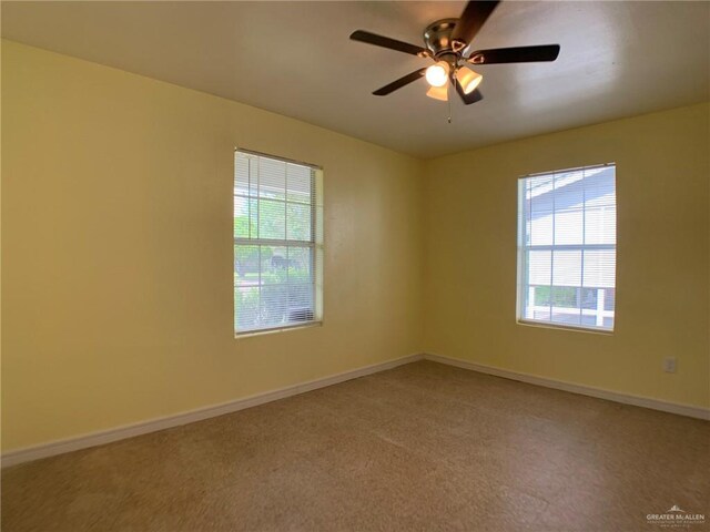 205 W Beck St, Harlingen, TX 78550 - spare room with plenty of natural light, carpet floors, and ceiling fan