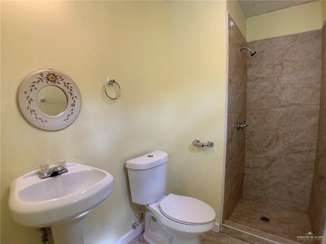 205 W Beck St, Harlingen, TX 78550 - bathroom featuring a shower stall and toilet